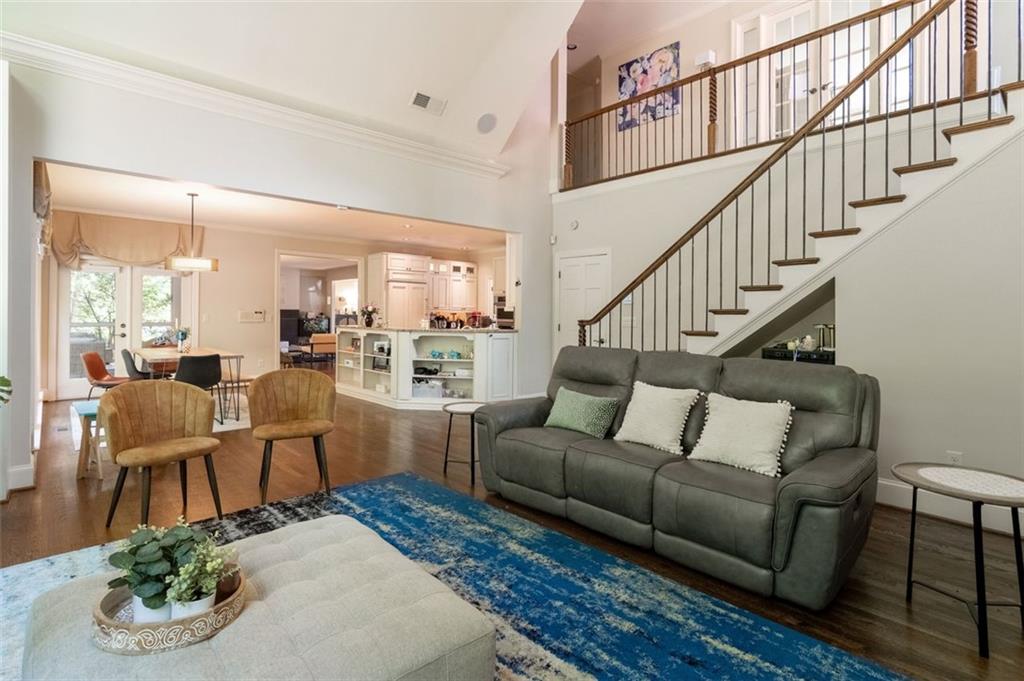 3850 Glenhurst Drive Smyrna, GA 30080 - Photo 18 of 43 a living room with furniture kitchen view and a wooden floor