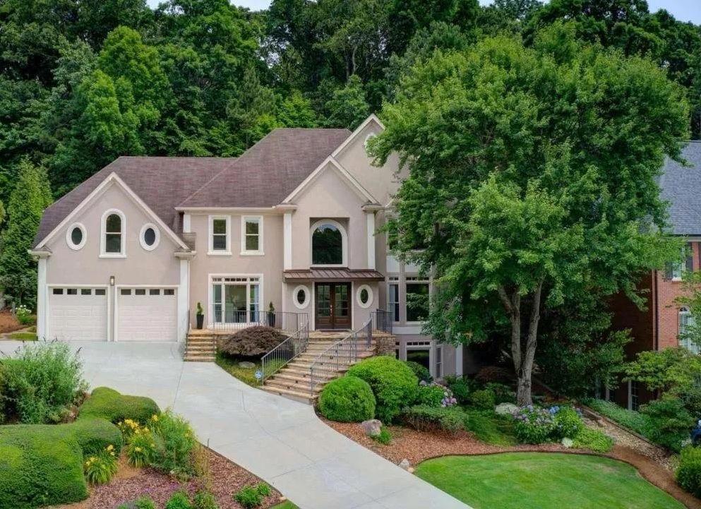3850 Glenhurst Drive Smyrna, GA 30080 - Photo 2 of 43 a front view of a house with garden