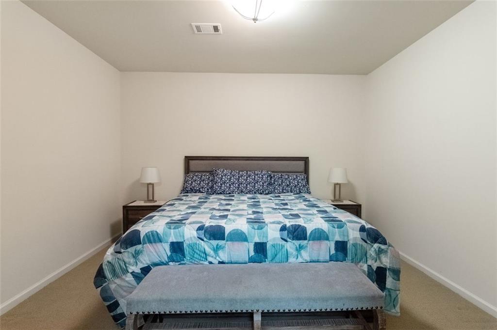 3850 Glenhurst Drive Smyrna, GA 30080 - Photo 40 of 43 a bedroom with a bed and a window