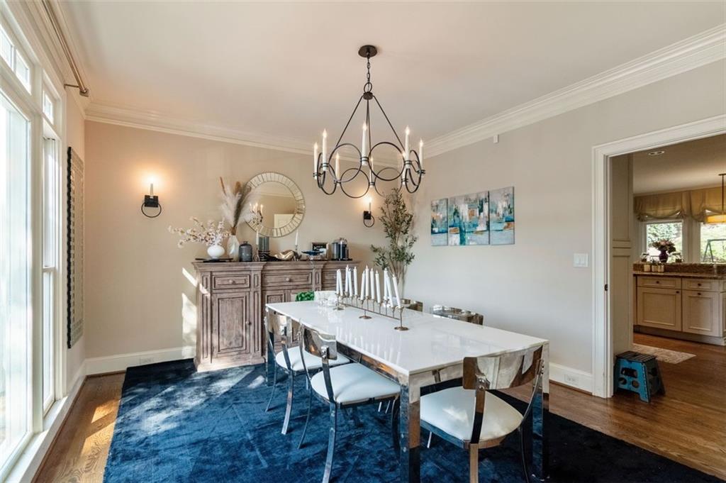 3850 Glenhurst Drive Smyrna, GA 30080 - Photo 9 of 43 a view of a dining room with furniture and wooden floor