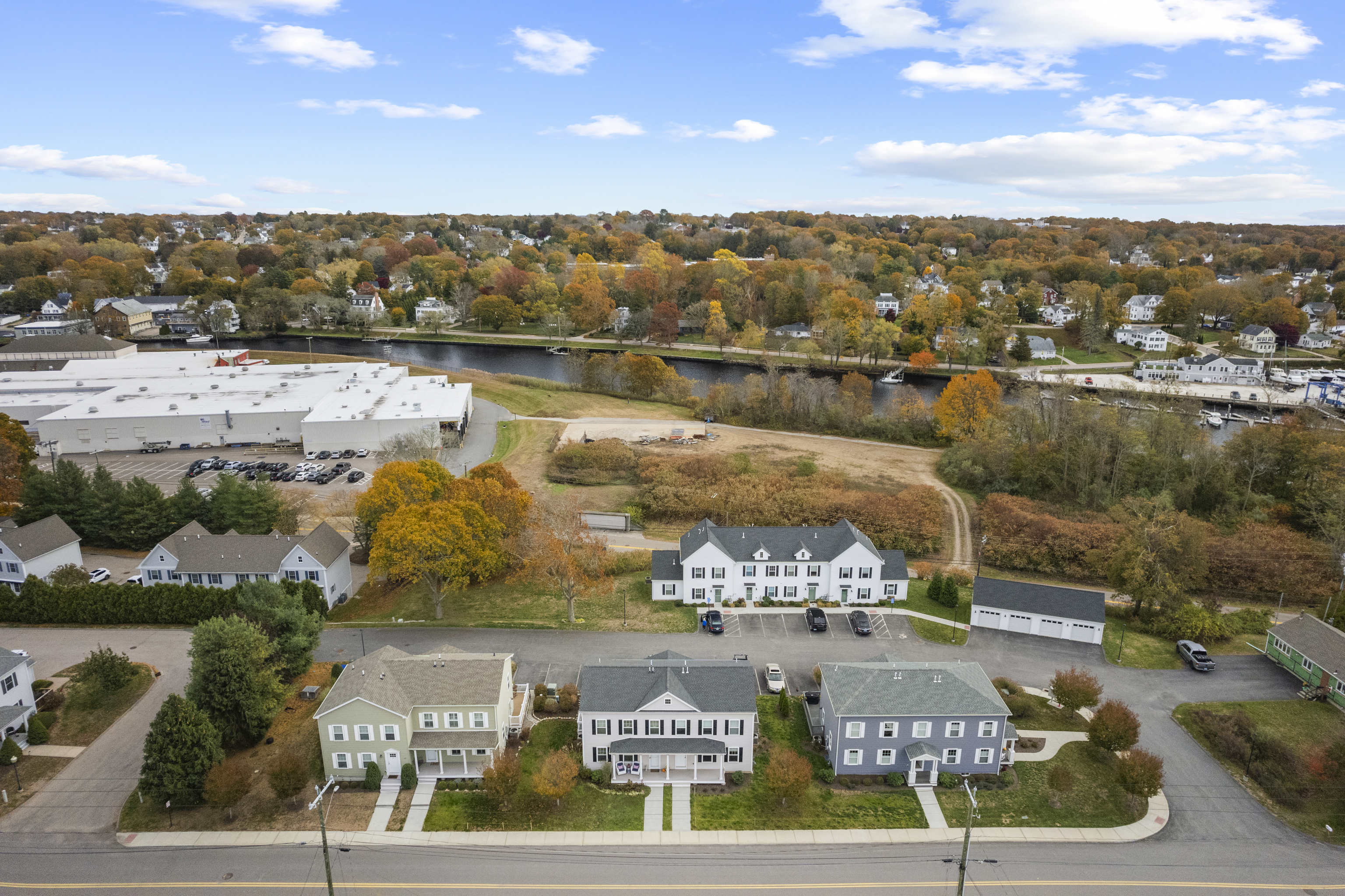 52 Prospect Street, Unit B Stonington, CT 06379 - Photo 1 of 1 a view of a lake with a mountain
