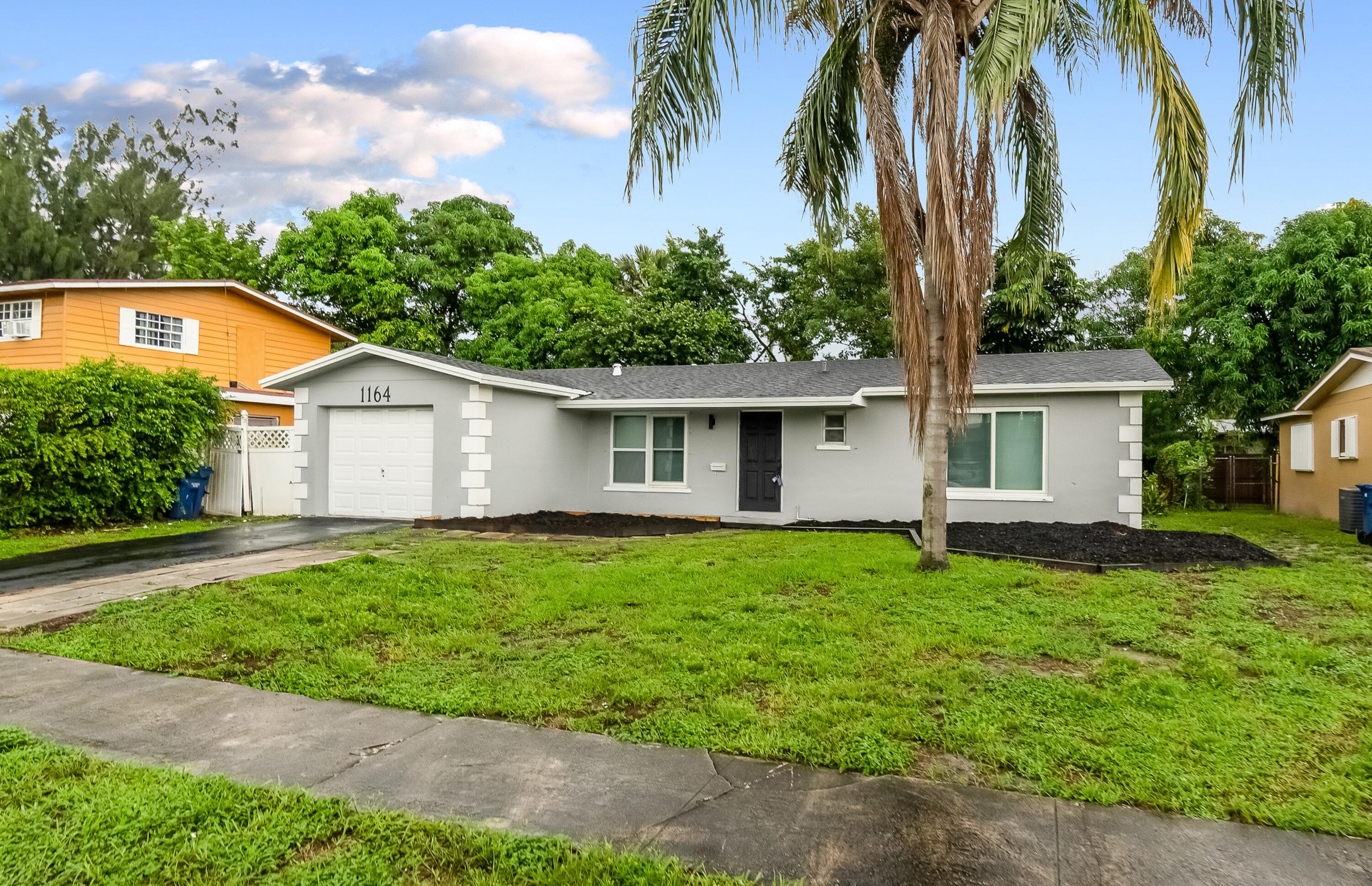 1164 Northwest 45th Terrace Lauderhill, FL 33313 - Photo 4 of 28 38-G