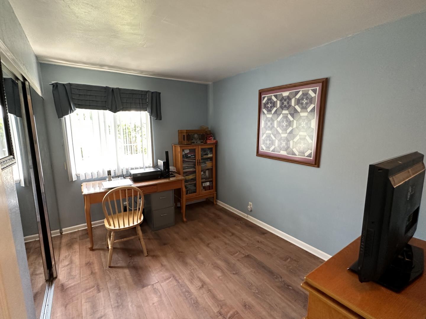 1632 Dixie Drive San Jose, CA 95122 - Photo 14 of 28 a view of workspace with wooden floor windows