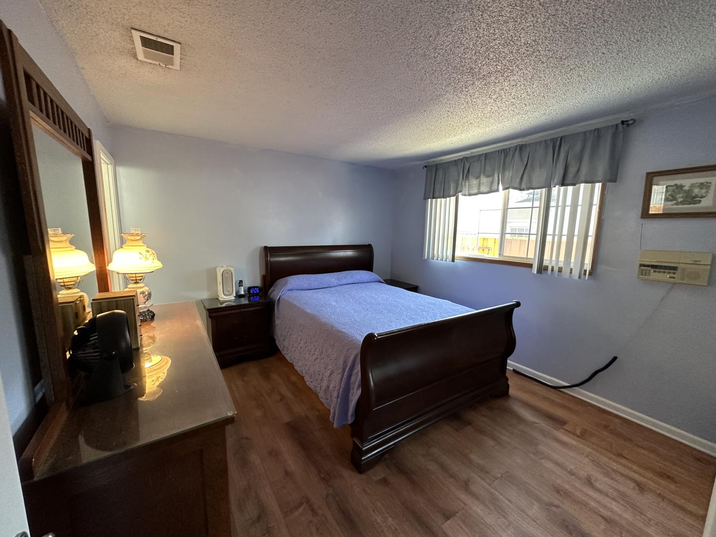 1632 Dixie Drive San Jose, CA 95122 - Photo 17 of 28 a bedroom with a bed and window