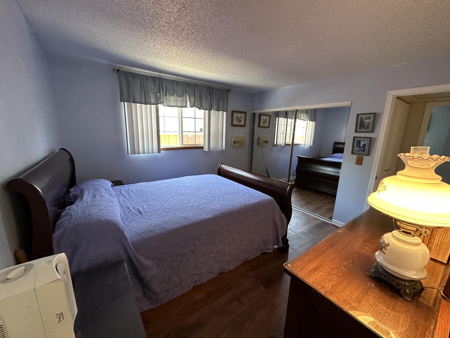 1632 Dixie Drive San Jose, CA 95122 - Photo 18 of 28 a bedroom with a bed and window