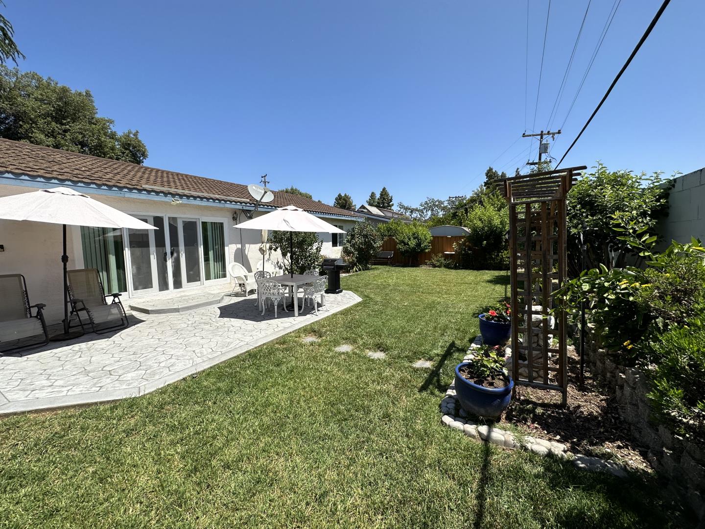 1632 Dixie Drive San Jose, CA 95122 - Photo 21 of 28 a view of a house with backyard porch and sitting area