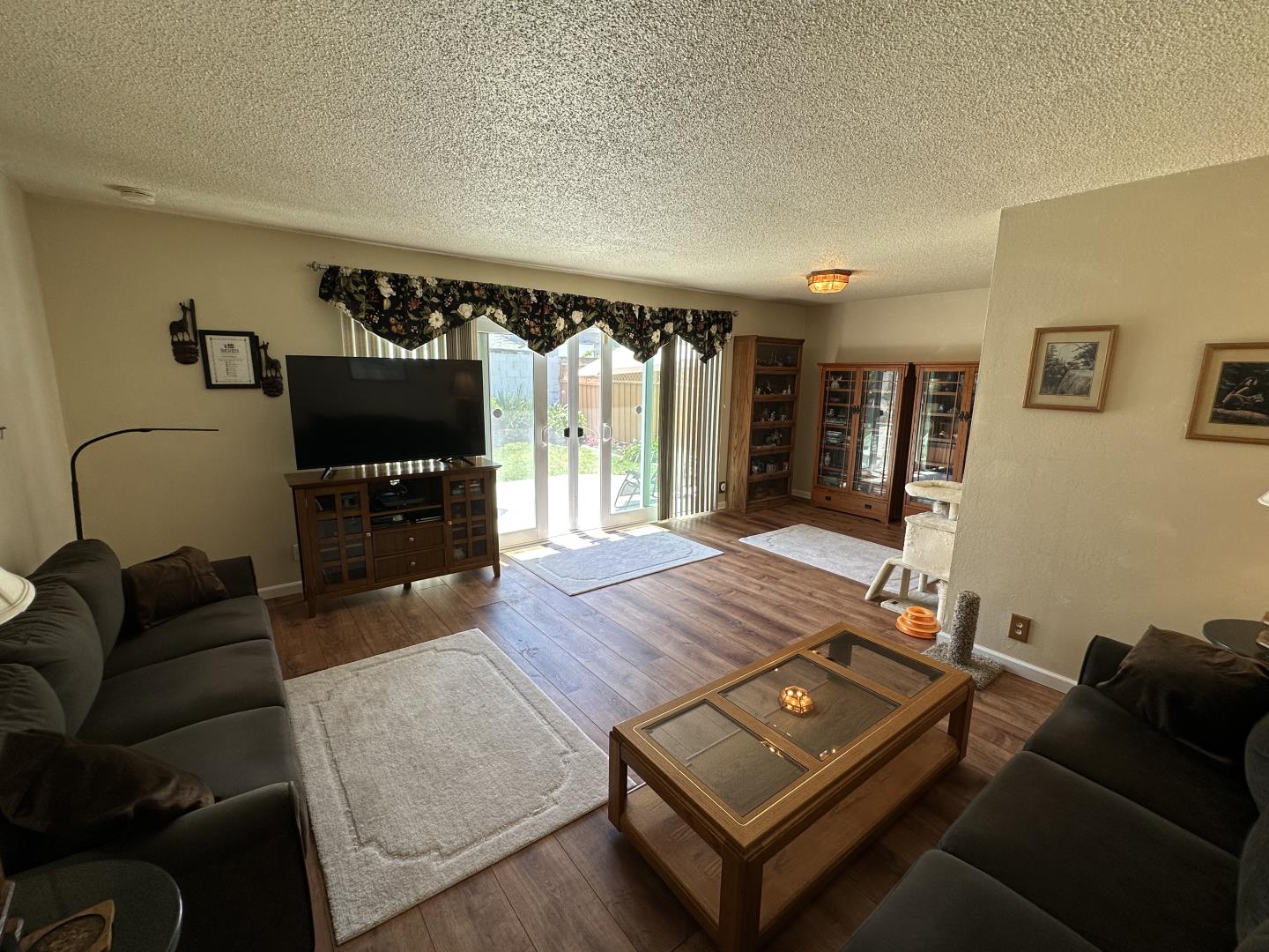 1632 Dixie Drive San Jose, CA 95122 - Photo 10 of 28 a living room with furniture and a flat screen tv