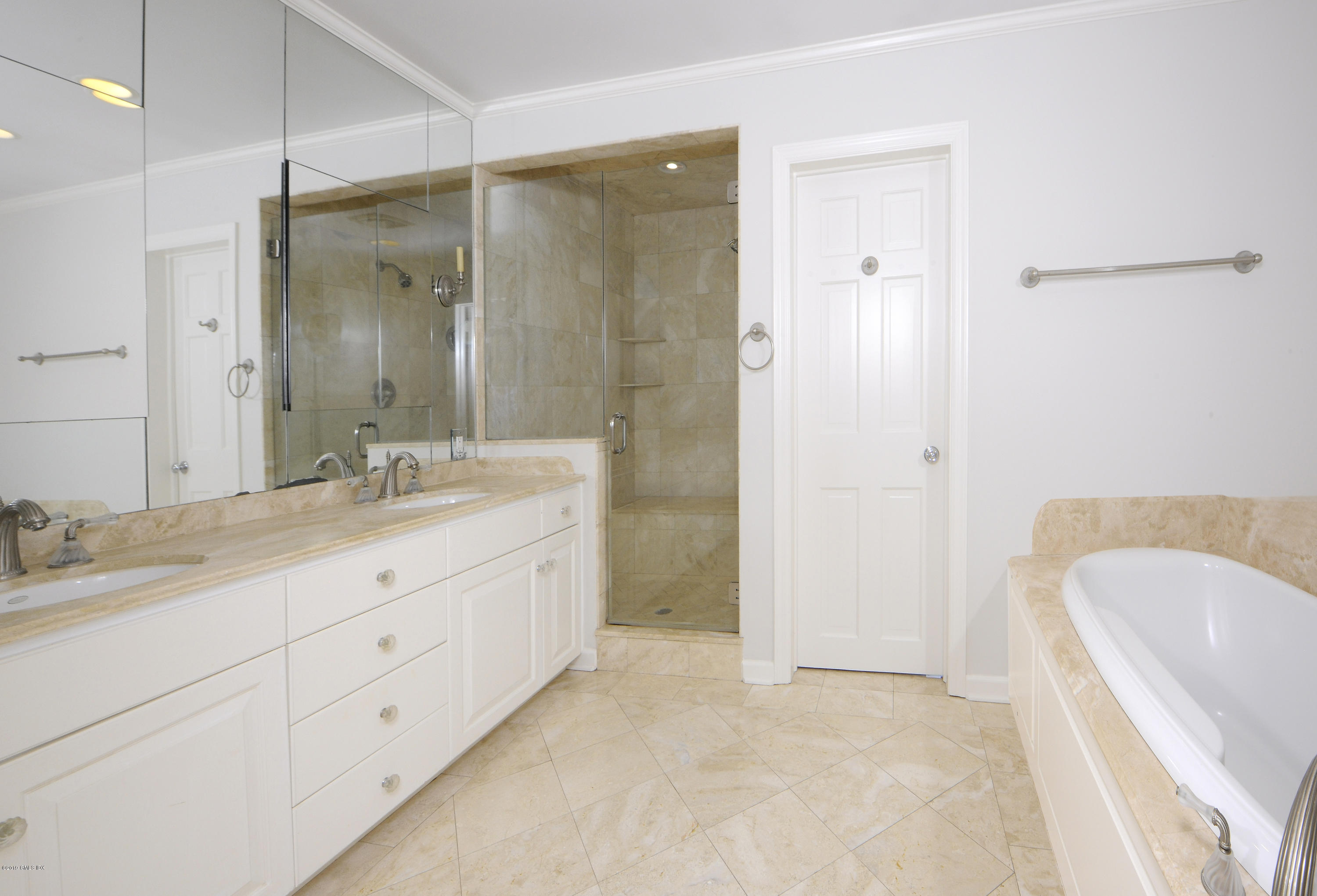 177 Indian Head Road Riverside, CT 06878 - Photo 12 of 24 a spacious bathroom with a double vanity sink mirror and shower