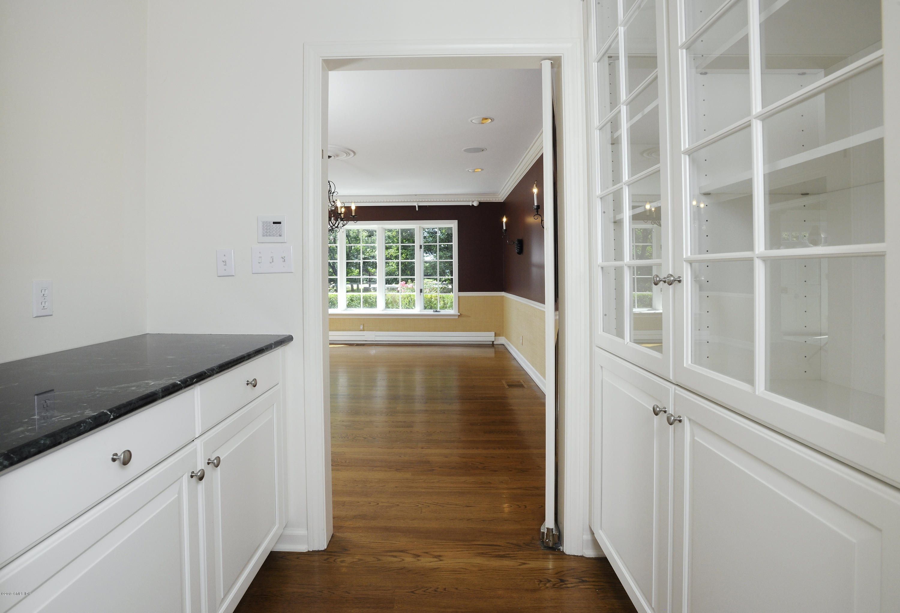 177 Indian Head Road Riverside, CT 06878 - Photo 16 of 24 a view of walk in closet with hardwood floor