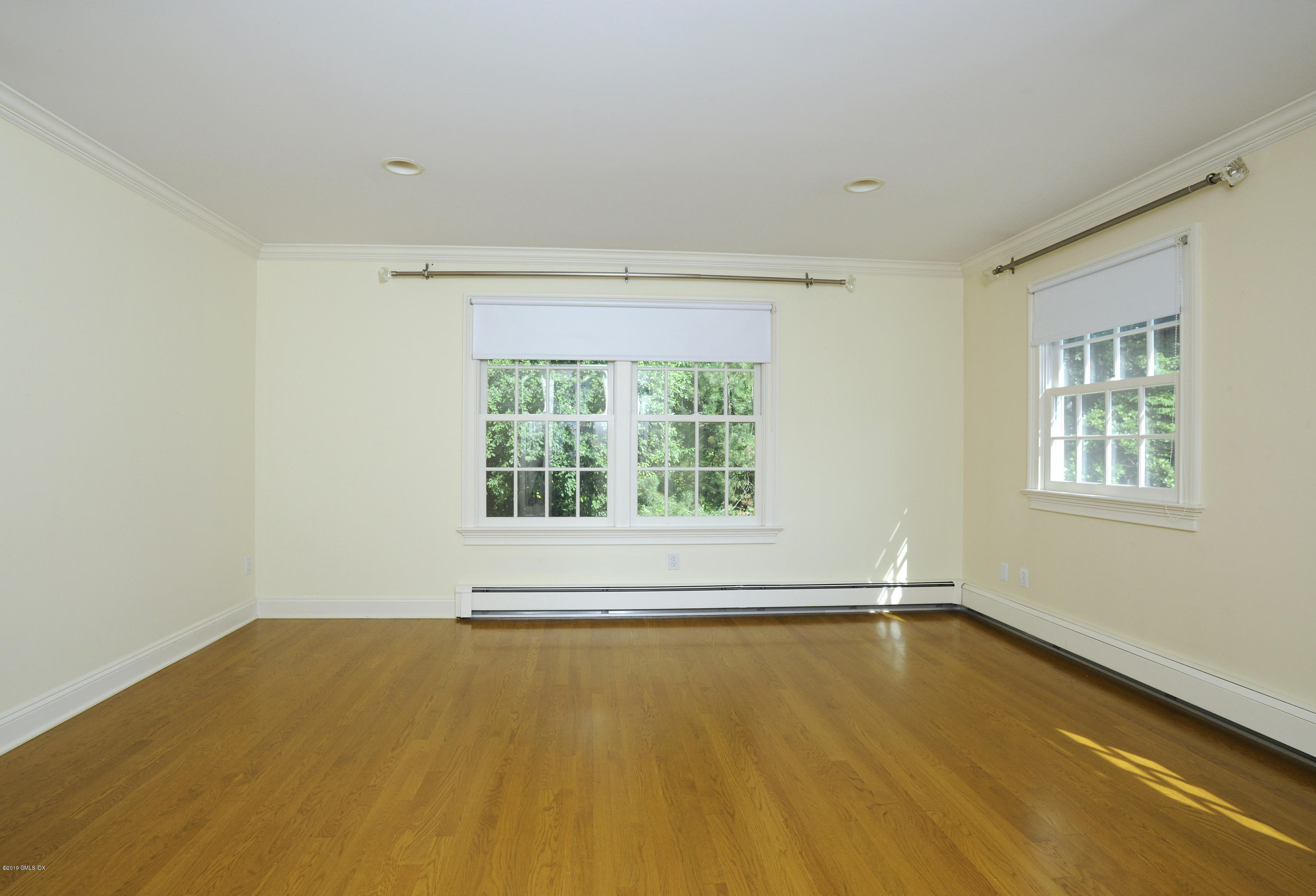 177 Indian Head Road Riverside, CT 06878 - Photo 21 of 24 a view of an empty room with a window