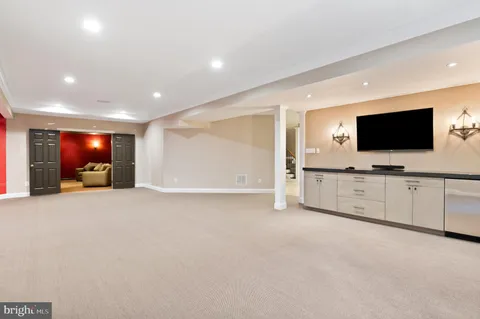 a view of room with flat screen tv