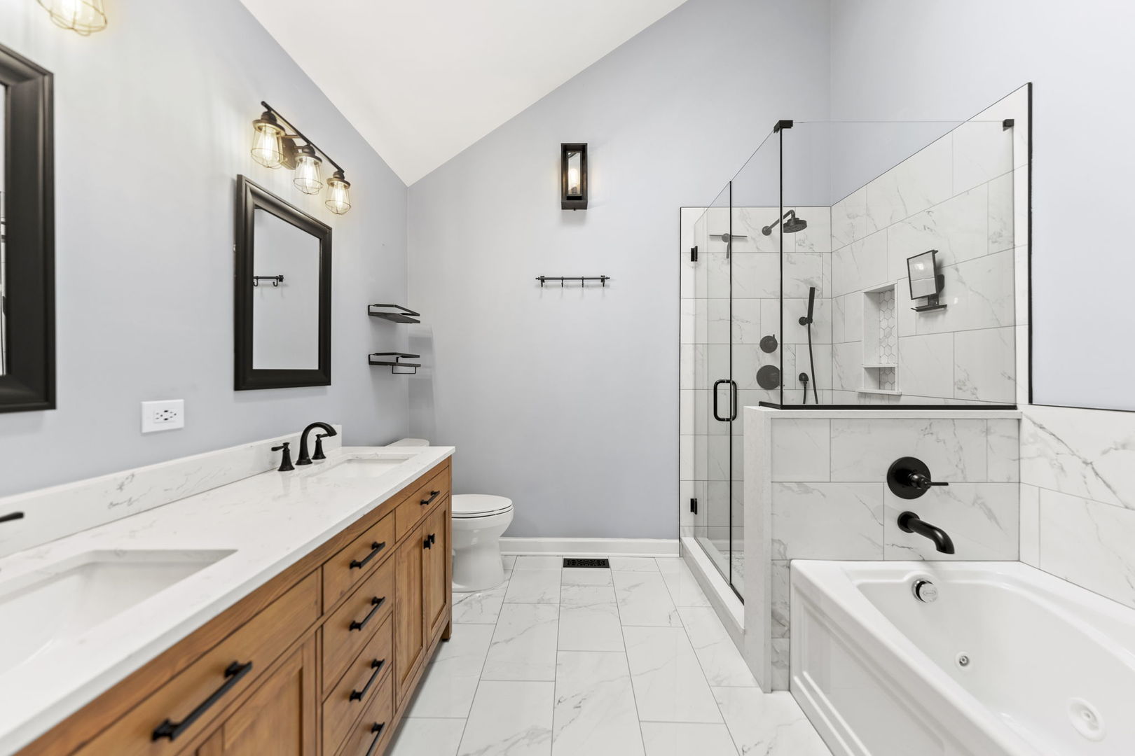 5509 Aspen Avenue Downers Grove, IL 60515 - Photo 17 of 38 a bathroom with a tub sink and mirror