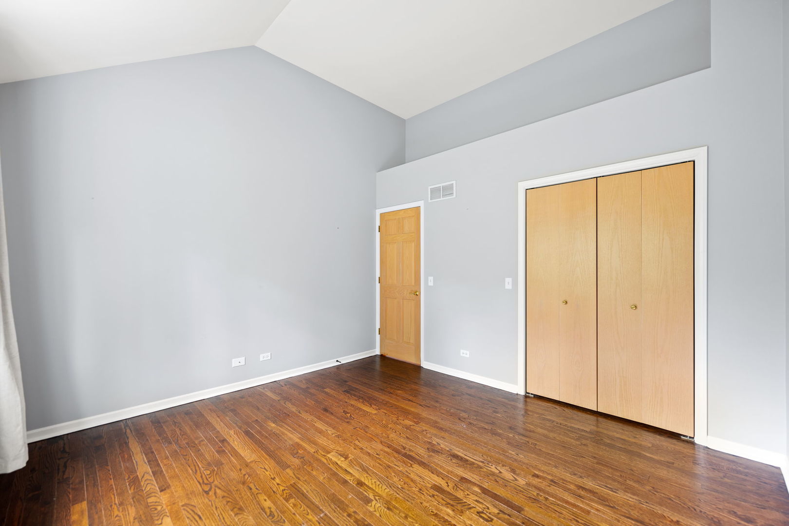 5509 Aspen Avenue Downers Grove, IL 60515 - Photo 25 of 38 a view of an empty room with wooden floor and closet