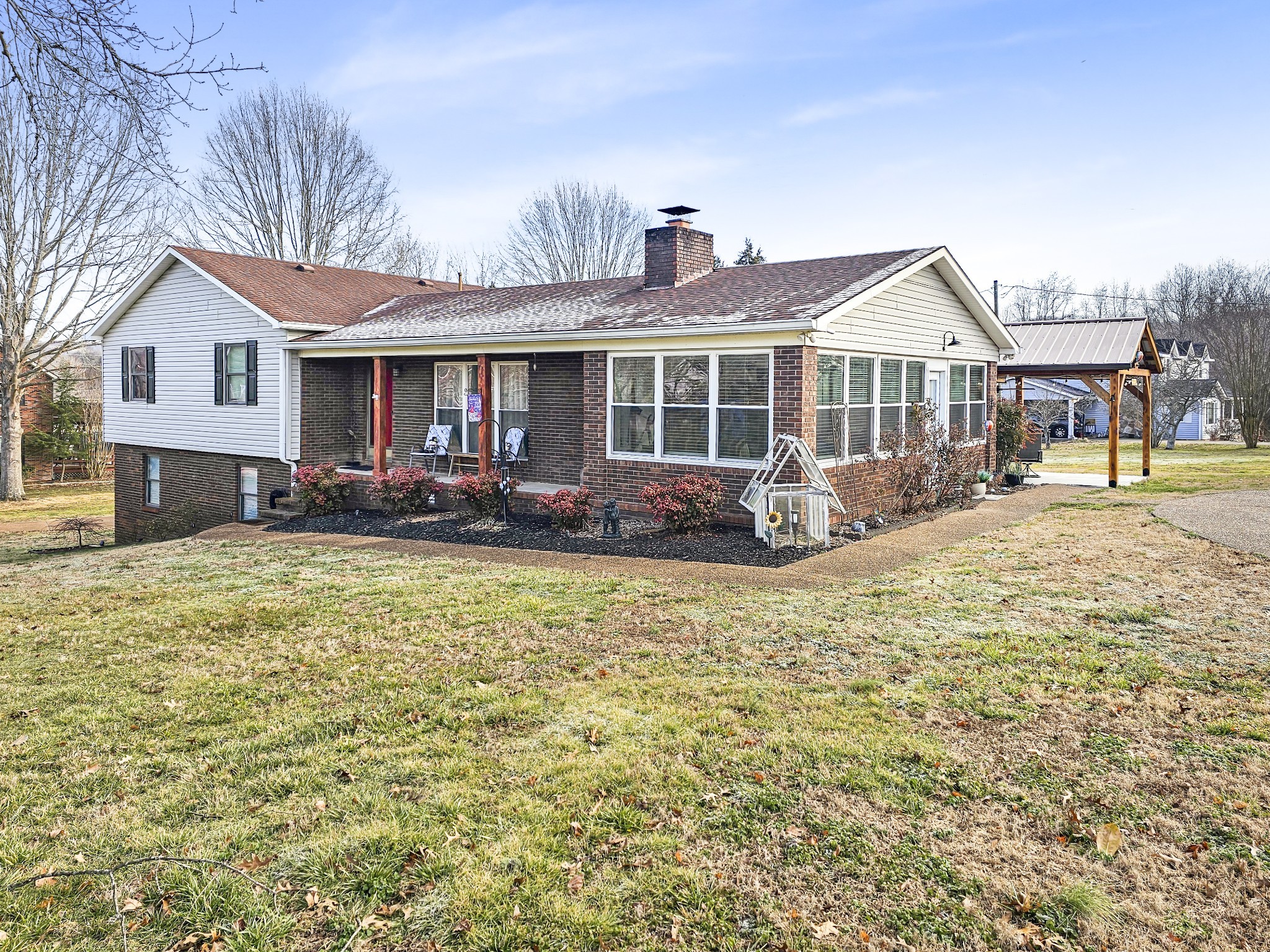 55 Morris Lane Carthage, TN 37030 - Photo 3 of 47 a front view of a house with garden