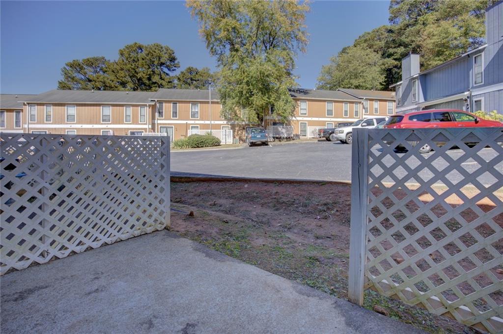 2340 Beaver Ruin Road, Unit UN15 Norcross, GA 30071 - Photo 27 of 30 a view of street with small yard