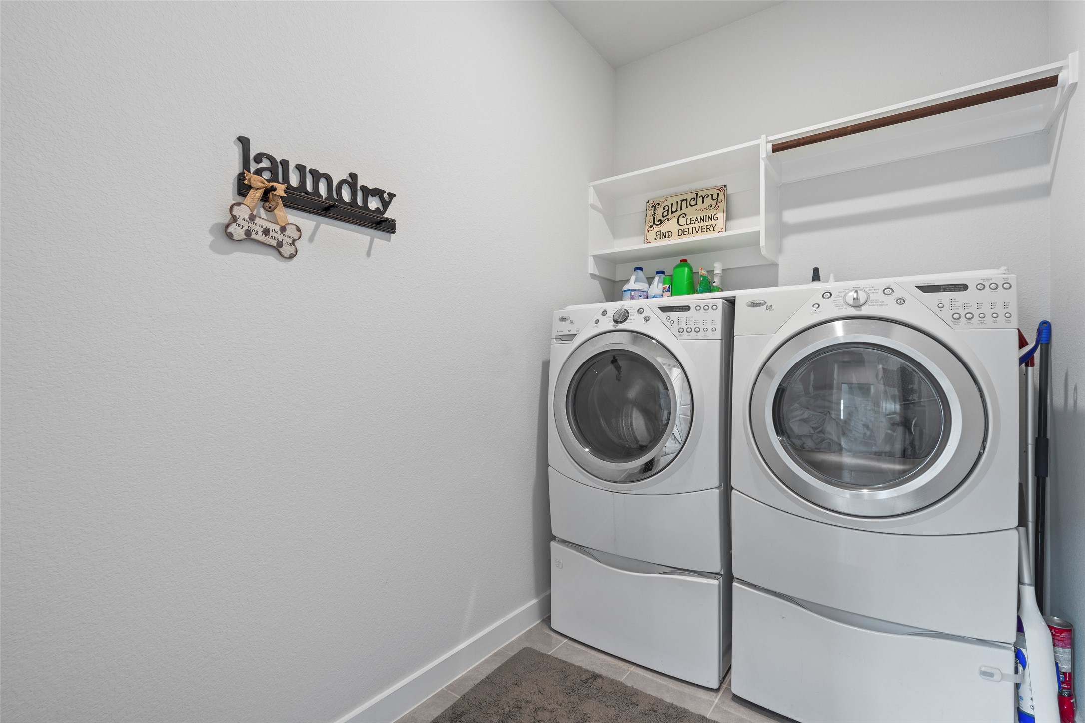 660 Pheasant Hill Lane Georgetown, TX 78628 - Photo 21 of 38 a utility room with dryer and washer
