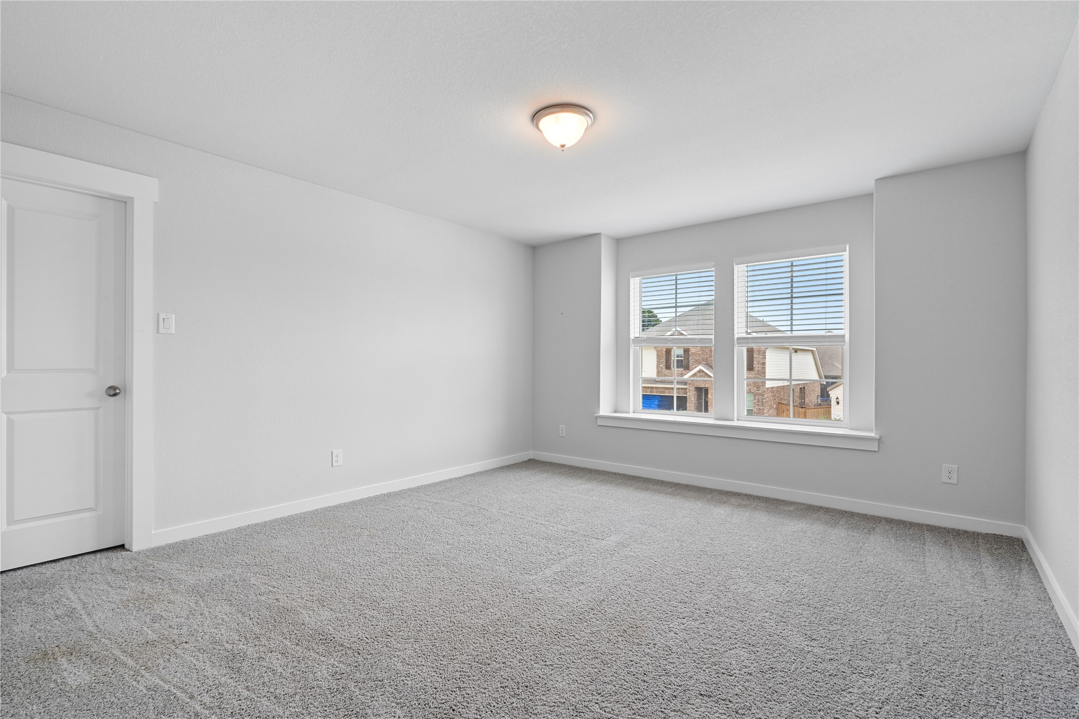 660 Pheasant Hill Lane Georgetown, TX 78628 - Photo 22 of 38 an empty room with windows