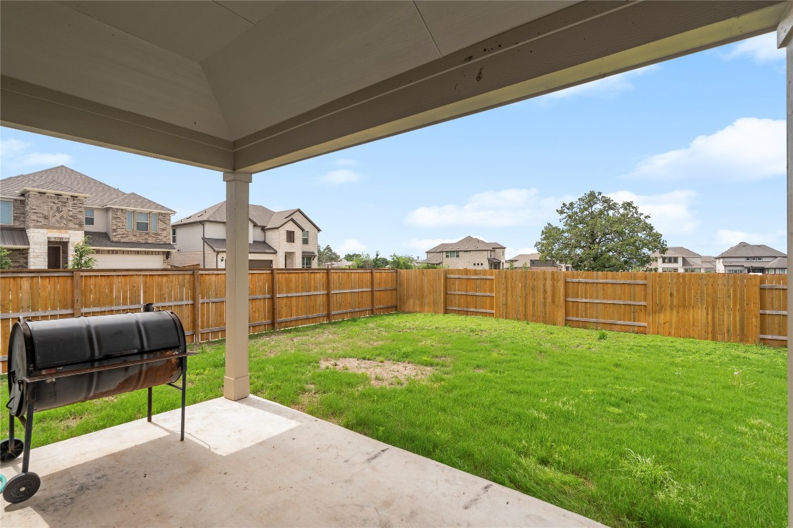 660 Pheasant Hill Lane Georgetown, TX 78628 - Photo 29 of 38 a view of a backyard