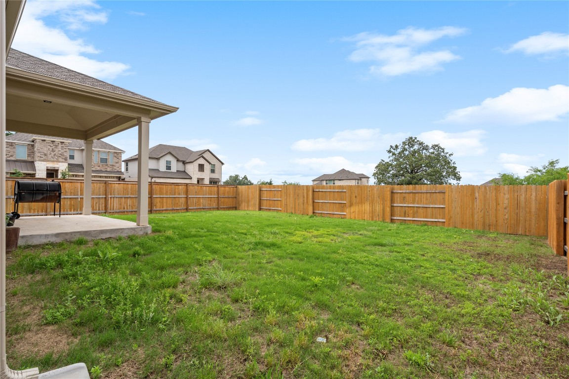 660 Pheasant Hill Lane Georgetown, TX 78628 - Photo 35 of 38 a view of a backyard