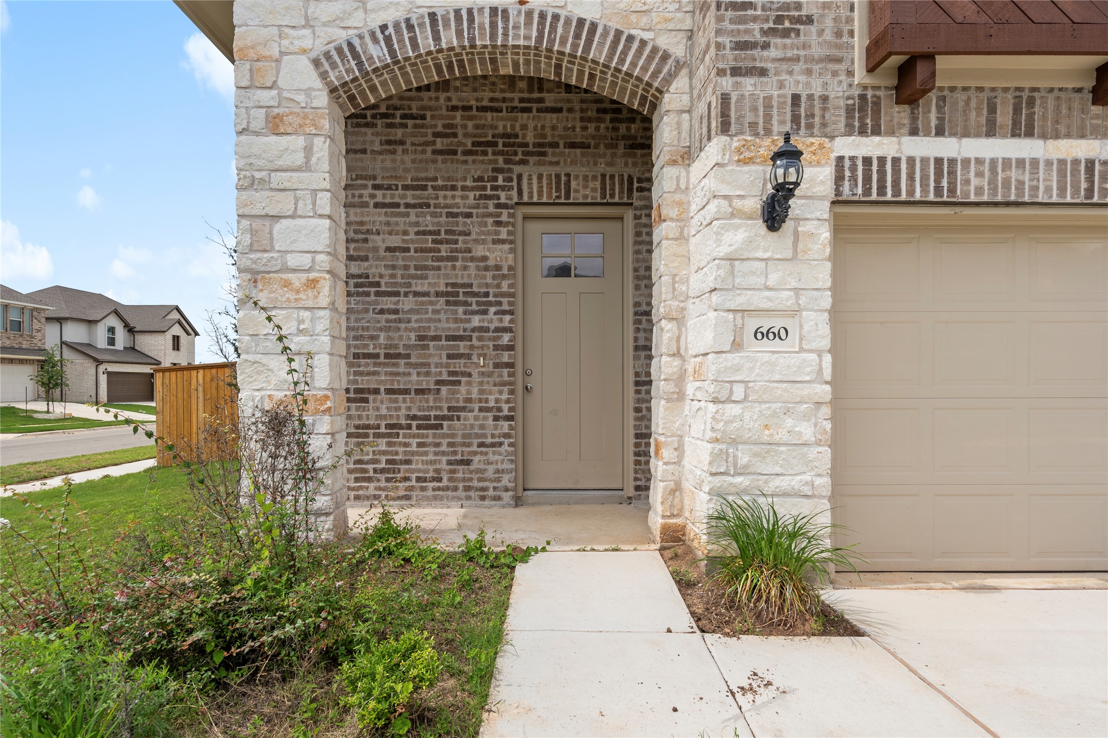 660 Pheasant Hill Lane Georgetown, TX 78628 - Photo 4 of 38 front view of a brick house
