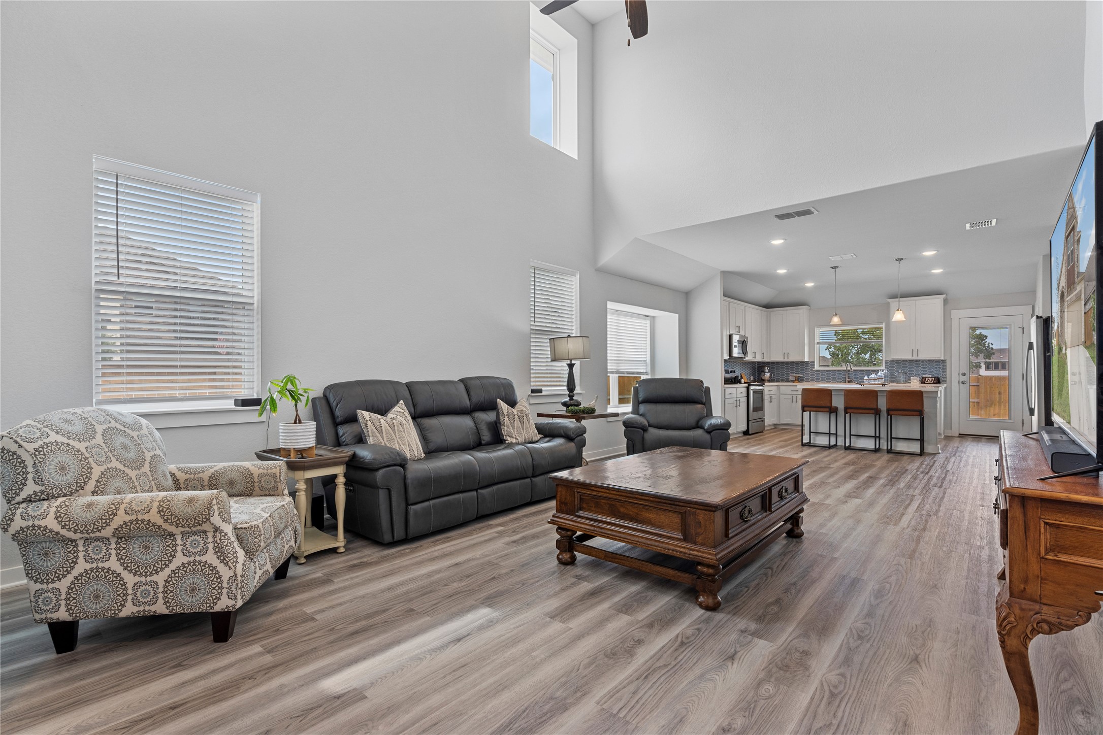 660 Pheasant Hill Lane Georgetown, TX 78628 - Photo 7 of 38 a living room with furniture and a wooden floor
