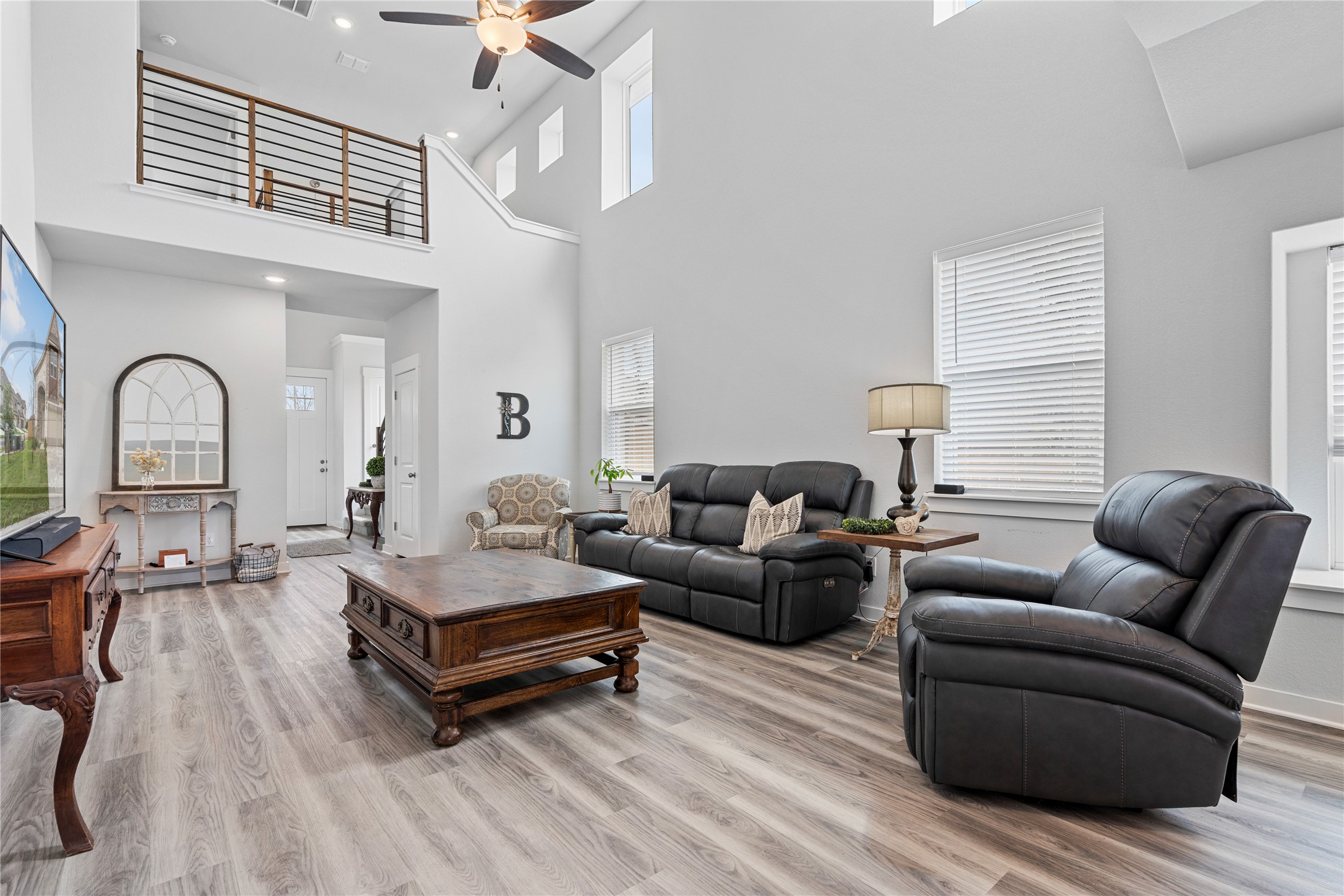 660 Pheasant Hill Lane Georgetown, TX 78628 - Photo 8 of 38 a living room with furniture and wooden floor