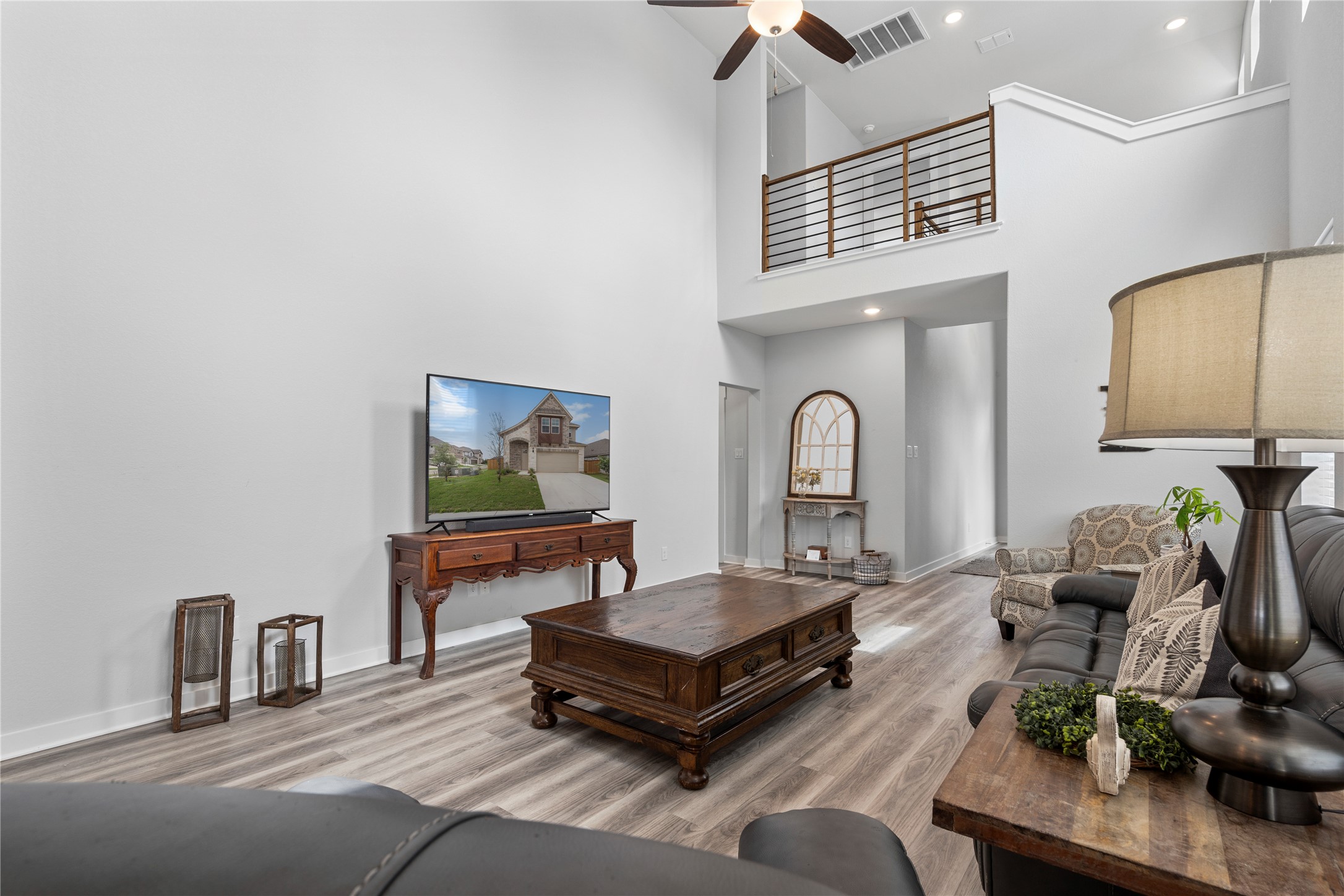 660 Pheasant Hill Lane Georgetown, TX 78628 - Photo 10 of 38 a living room with furniture and wooden floor
