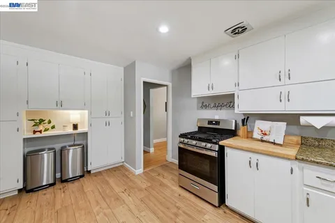 a hallway with washer and dryer