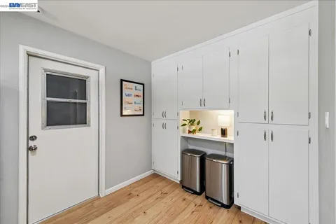 a bedroom with double bed and a window