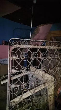 a kitchen with a refrigerator and a sink