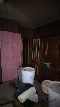 a view of a backyard of the house