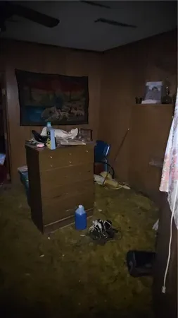 a view of a yard with a house and trees