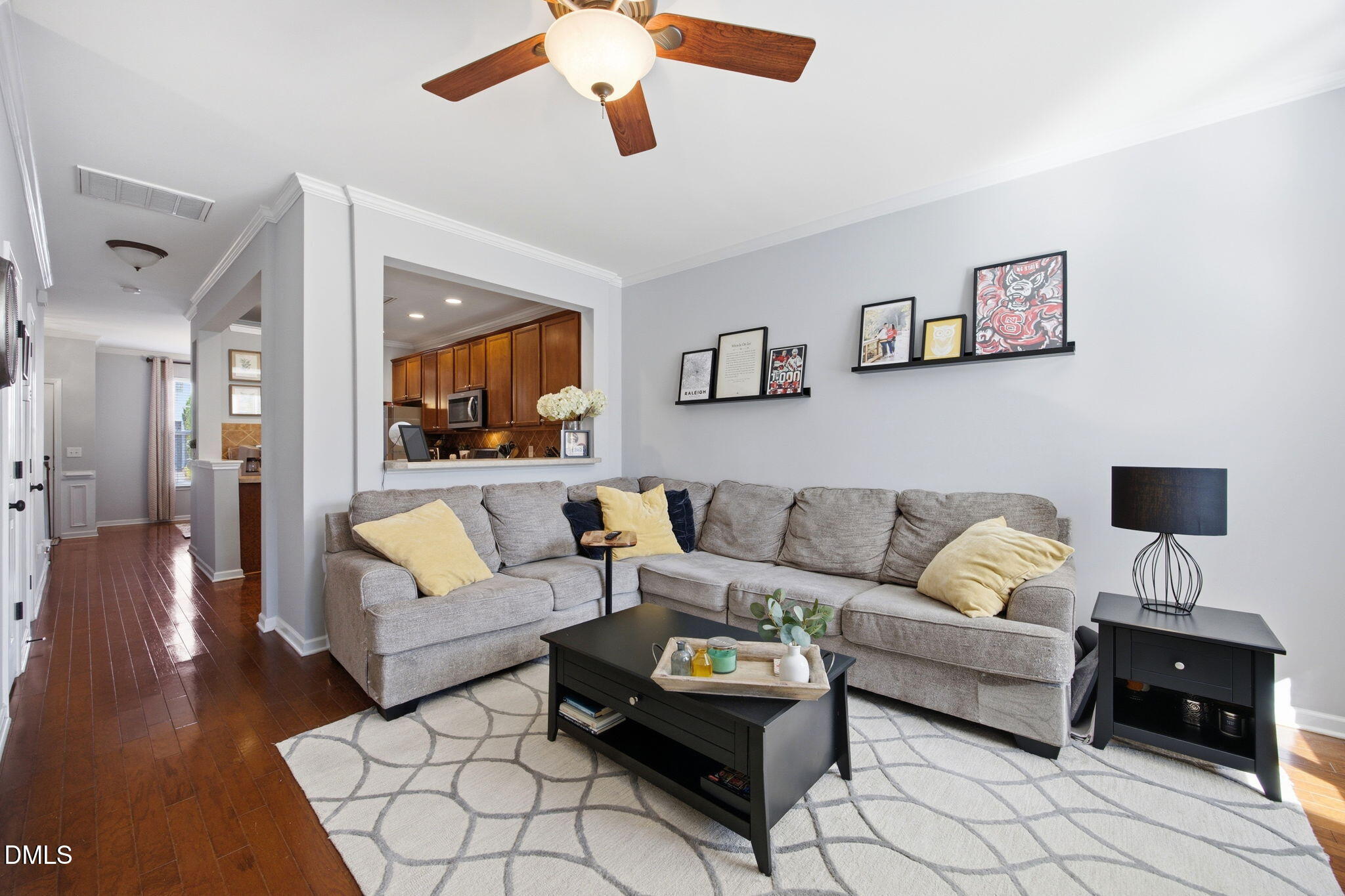 2827 Corbett Grove Drive Raleigh, NC 27616 - Photo 18 of 49 a living room with furniture and a flat screen tv