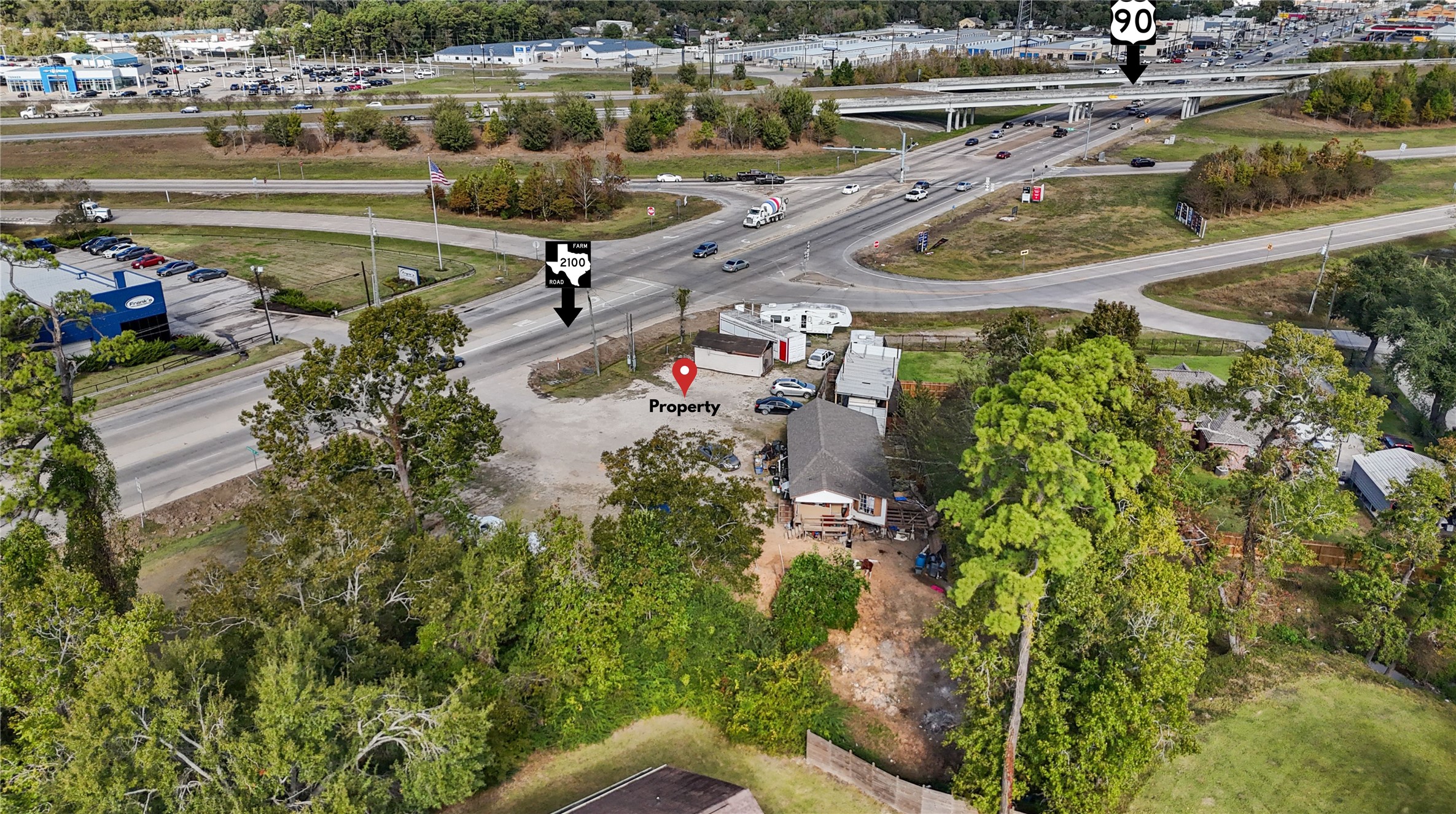 13314 Crosby Lynchburg Road Crosby, TX 77532 - Photo 3 of 9 a view of a lake with a yard and outdoor seating