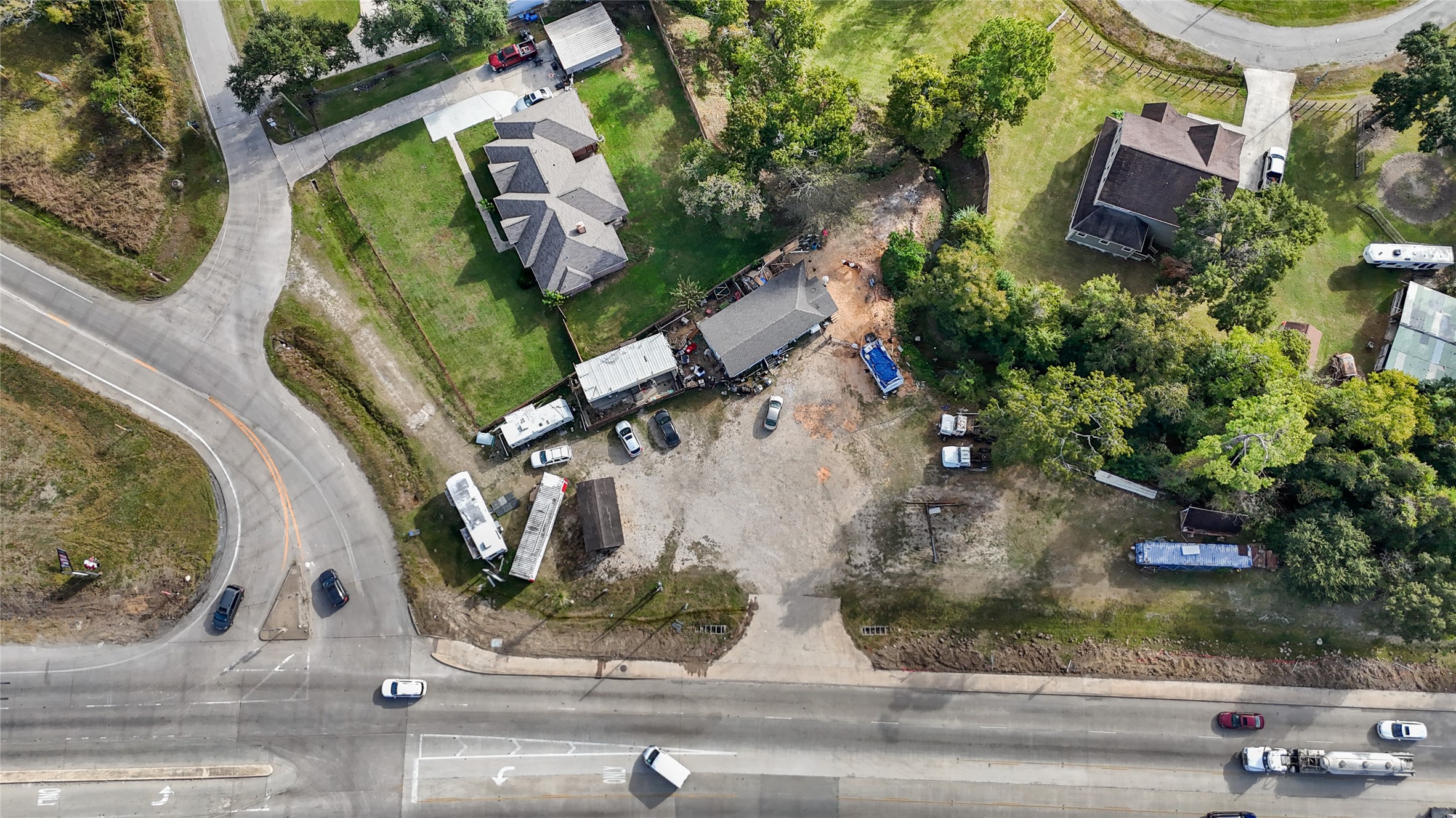 13314 Crosby Lynchburg Road Crosby, TX 77532 - Photo 9 of 9 an aerial view of a house with a yard and garage