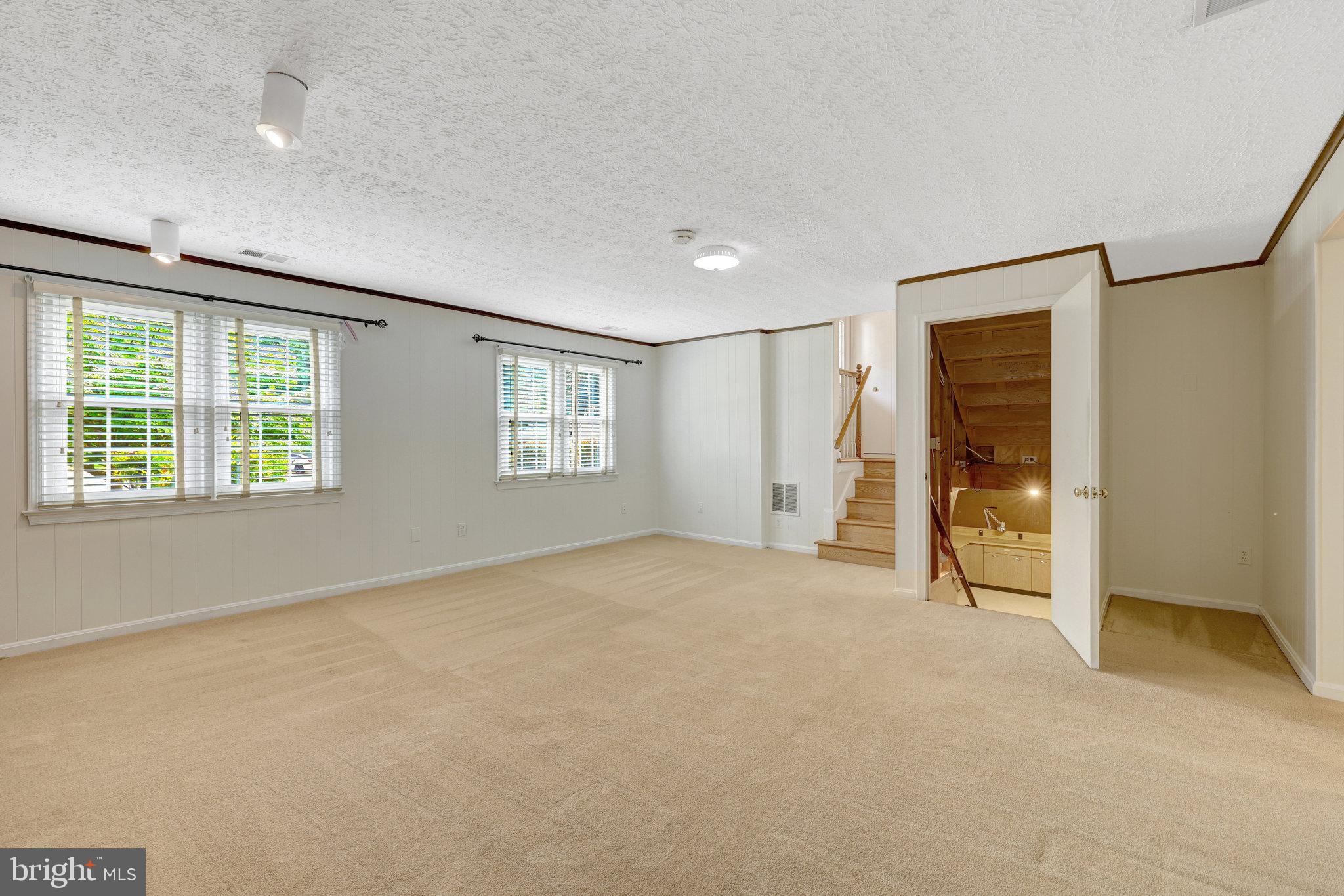 615 Kearney Court Southwest Vienna, VA 22180 - Photo 19 of 53 an empty room with windows