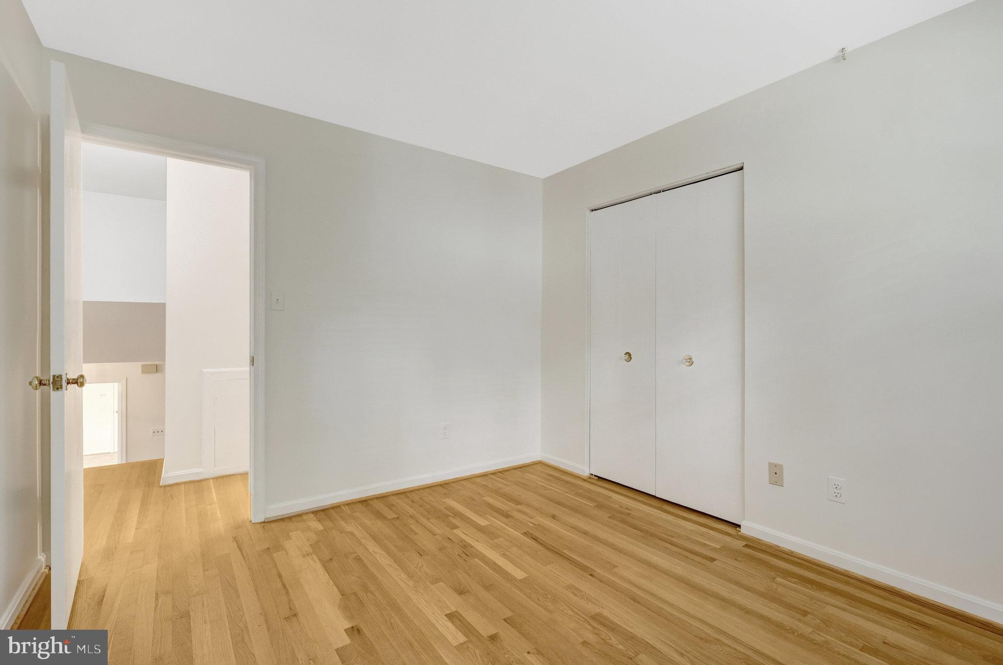 615 Kearney Court Southwest Vienna, VA 22180 - Photo 27 of 53 a view of empty room with wooden floor