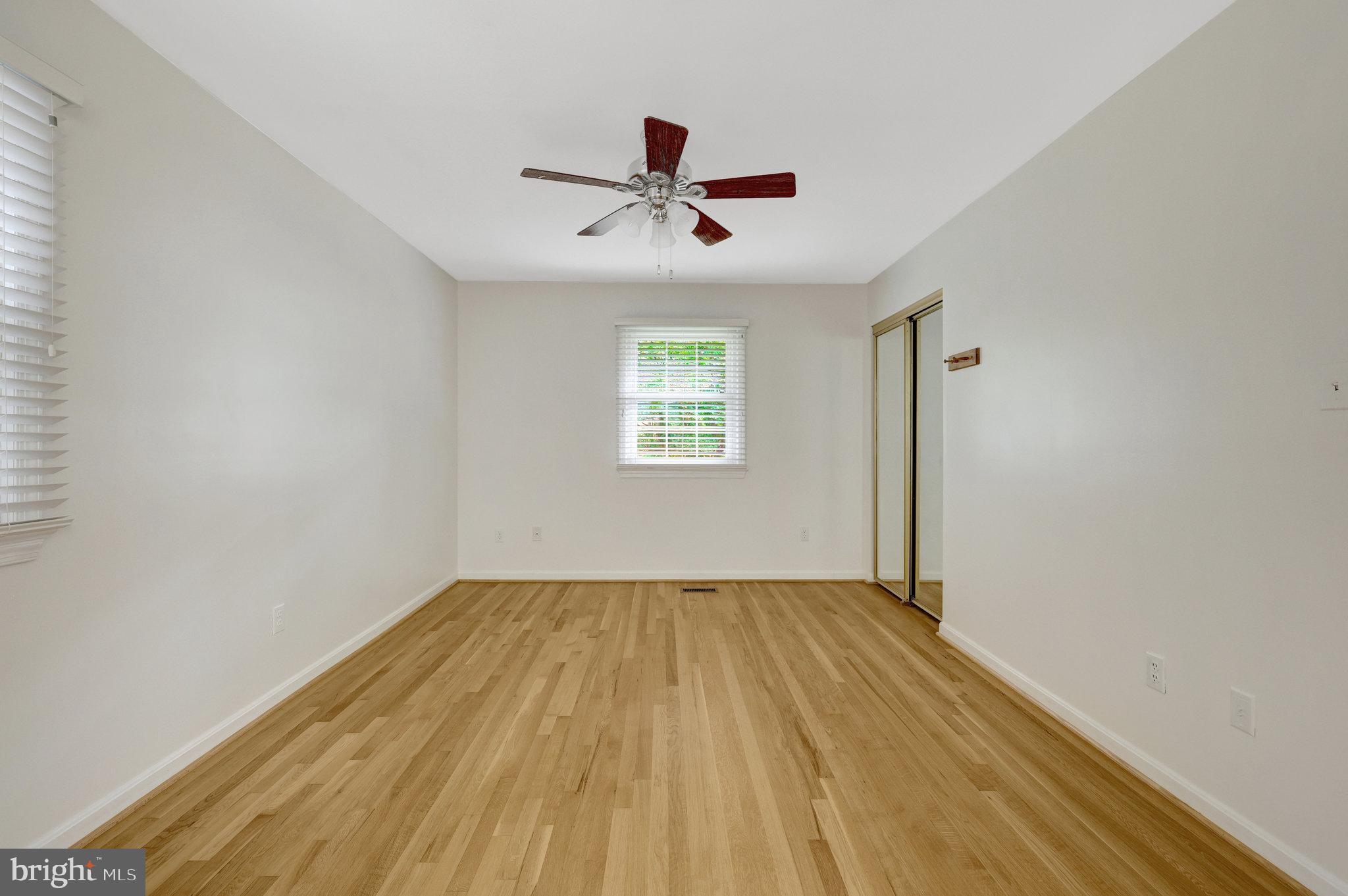 615 Kearney Court Southwest Vienna, VA 22180 - Photo 33 of 53 wooden floor in an empty room with a window