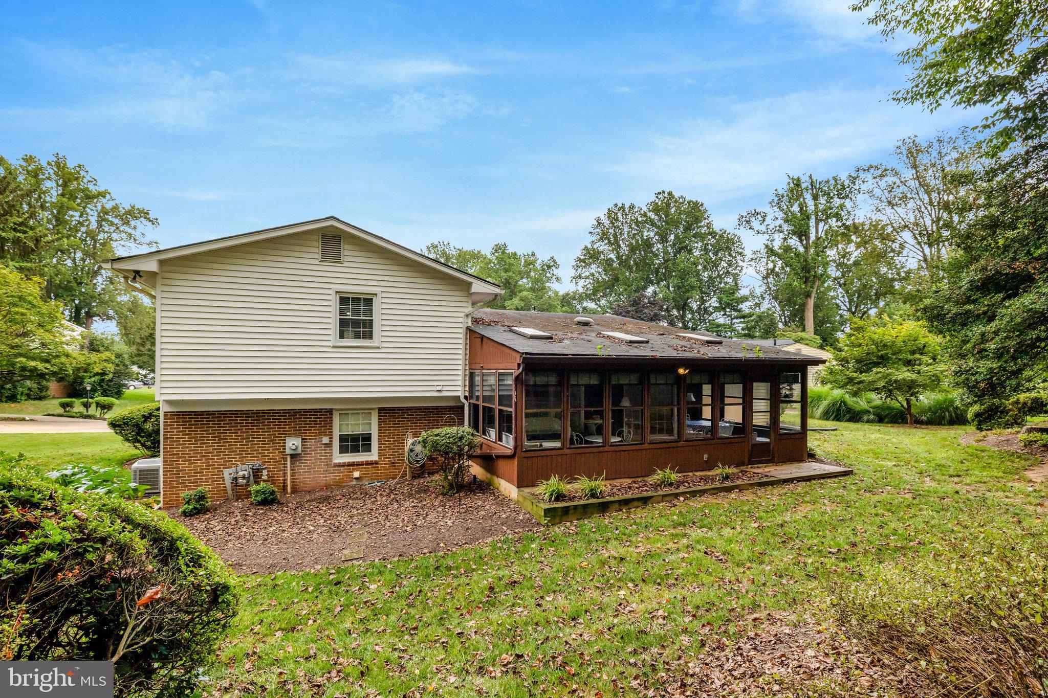 615 Kearney Court Southwest Vienna, VA 22180 - Photo 50 of 53 a view of a house with backyard and sitting area