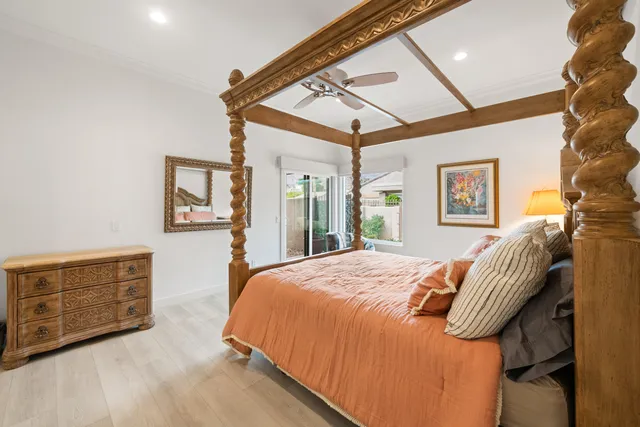 a bed room with a bed and a dresser