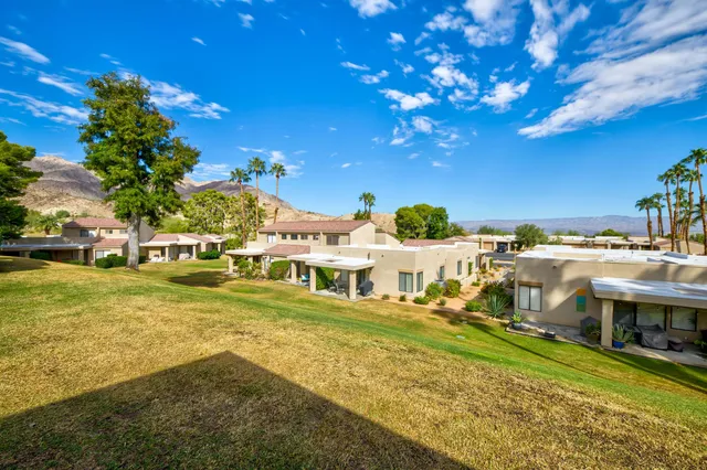 a view of yard with outdoor seating