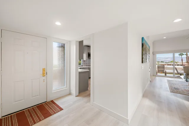 a view of livingroom with hardwood floor and a ceiling fan