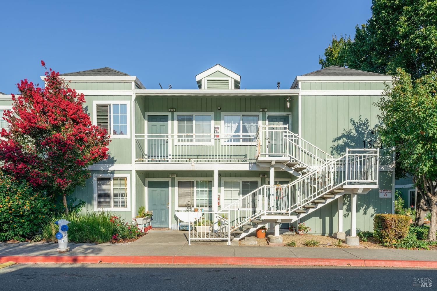 1501 La Esplanada Place, Unit 326 Santa Rosa, CA 95404 - Photo 1 of 10 a front view of a house with a yard