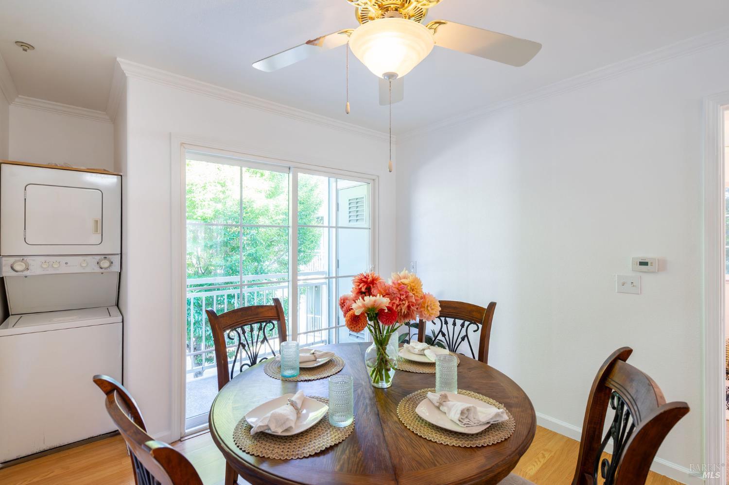 1501 La Esplanada Place, Unit 326 Santa Rosa, CA 95404 - Photo 7 of 10 a dining room with furniture and window