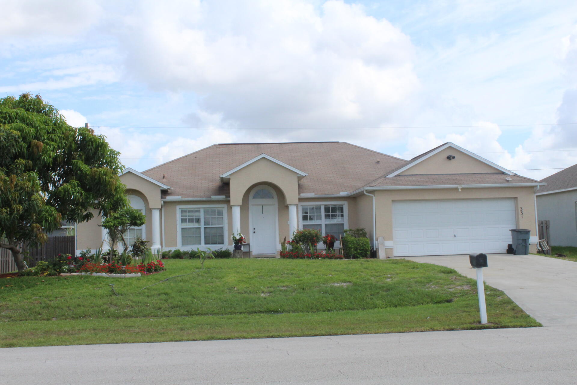 335 Southwest Dustin Avenue Port St. Lucie, FL 34953 - Photo 2 of 23 Front3 335 SW Dustin Ave