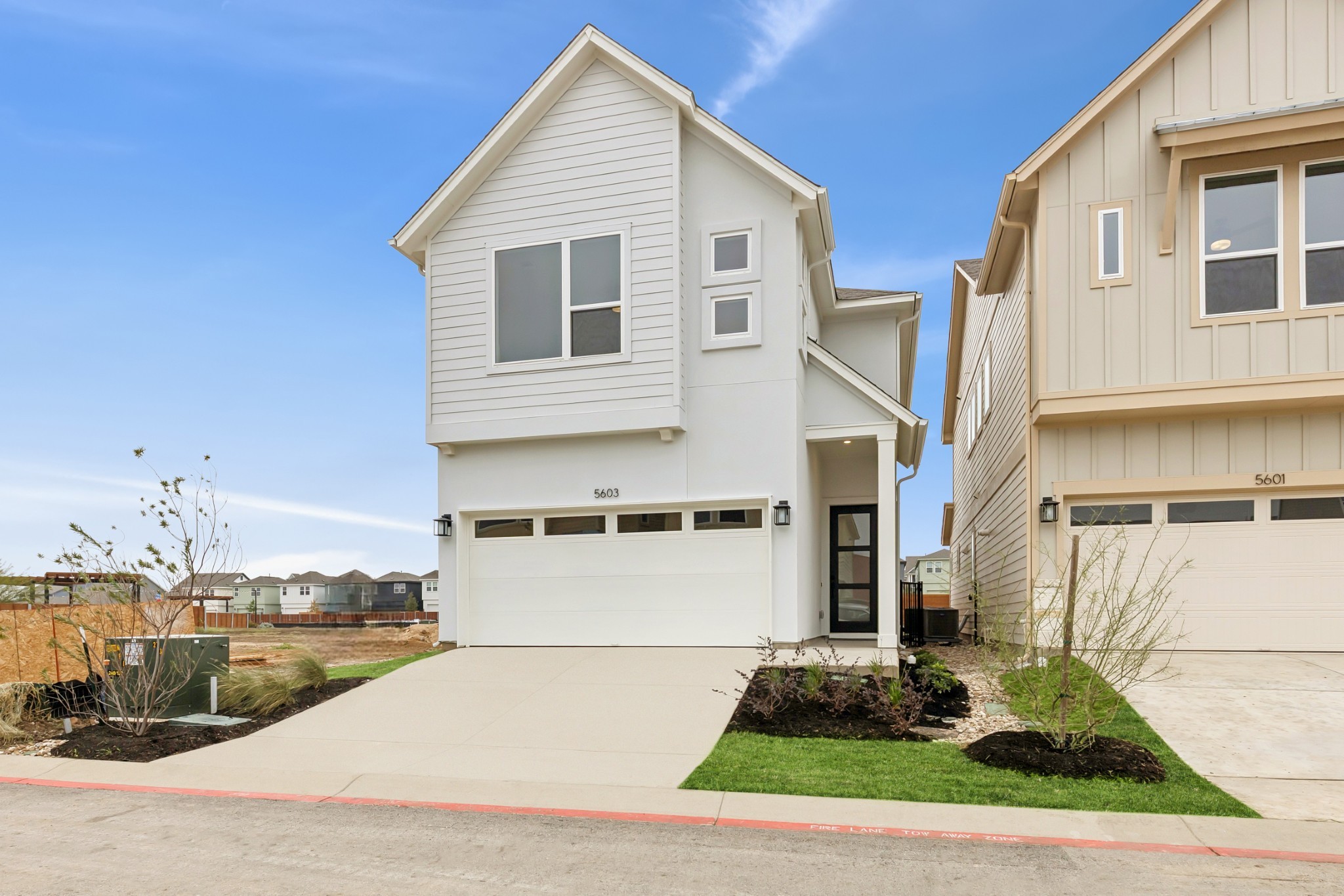 a view of a street with houses