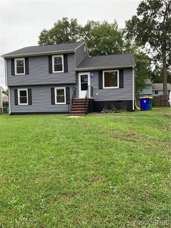 1616 Westbrook Road Hopewell, VA 23860 - Photo 2 of 24 a front view of a house with garden