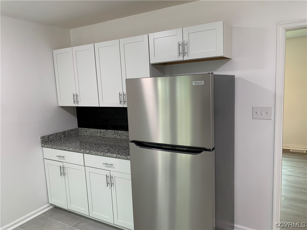 1616 Westbrook Road Hopewell, VA 23860 - Photo 8 of 24 a kitchen with appliances and cabinets