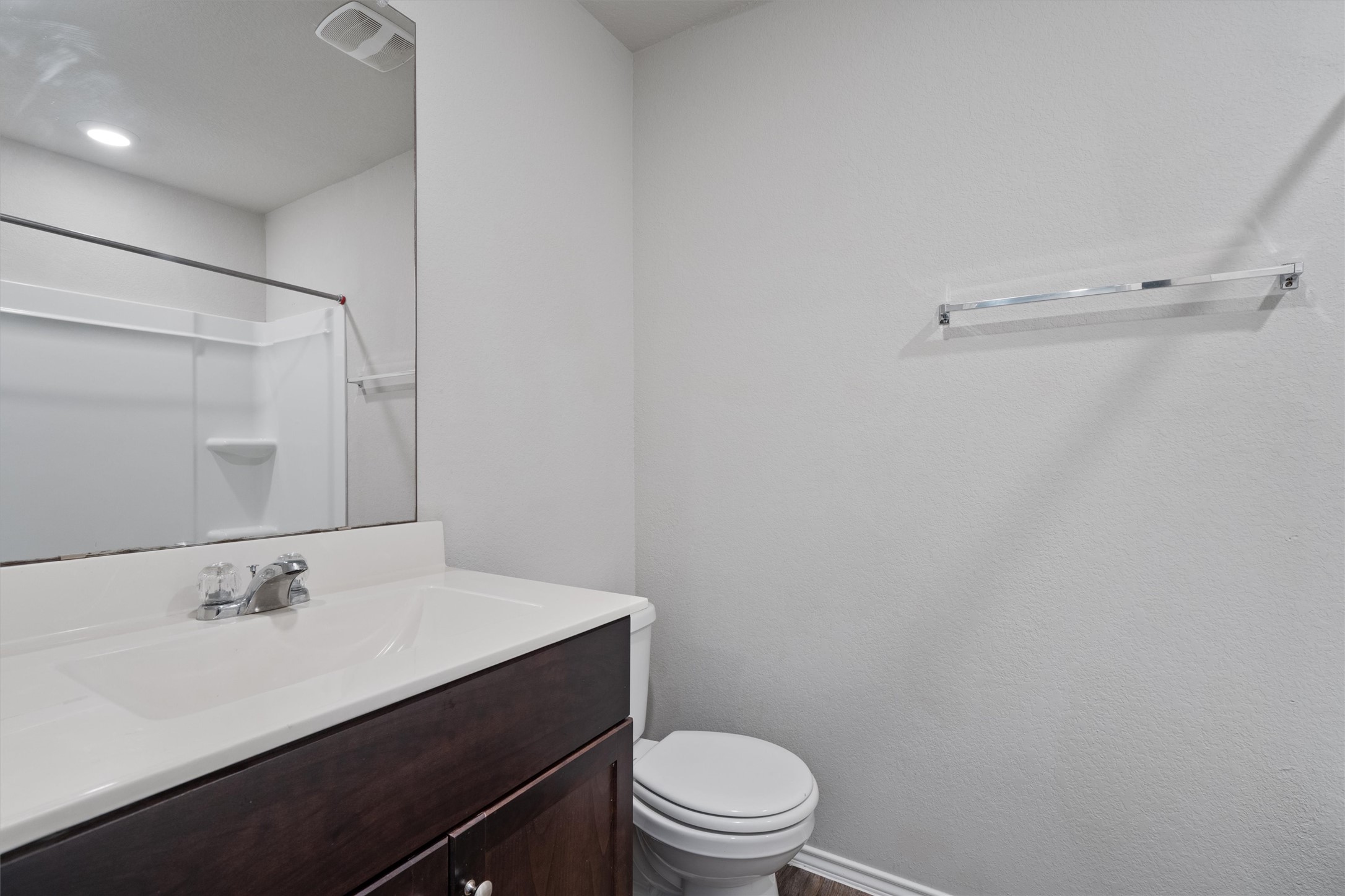 6121 Ronee Leah Drive Austin, TX 78724 - Photo 25 of 30 A well-appointed bath features a sleek vanity and convenient shower.