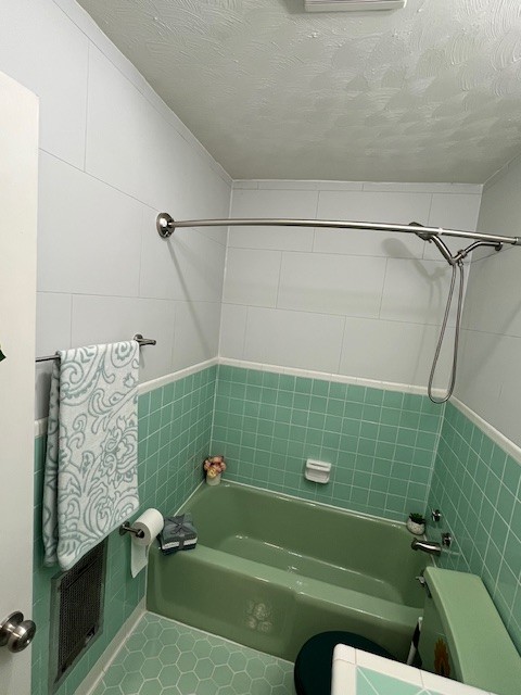 1386 Chisholm Road Cypress Inn, TN 38452 - Photo 49 of 58 a bathroom with a green bathtub and a shower